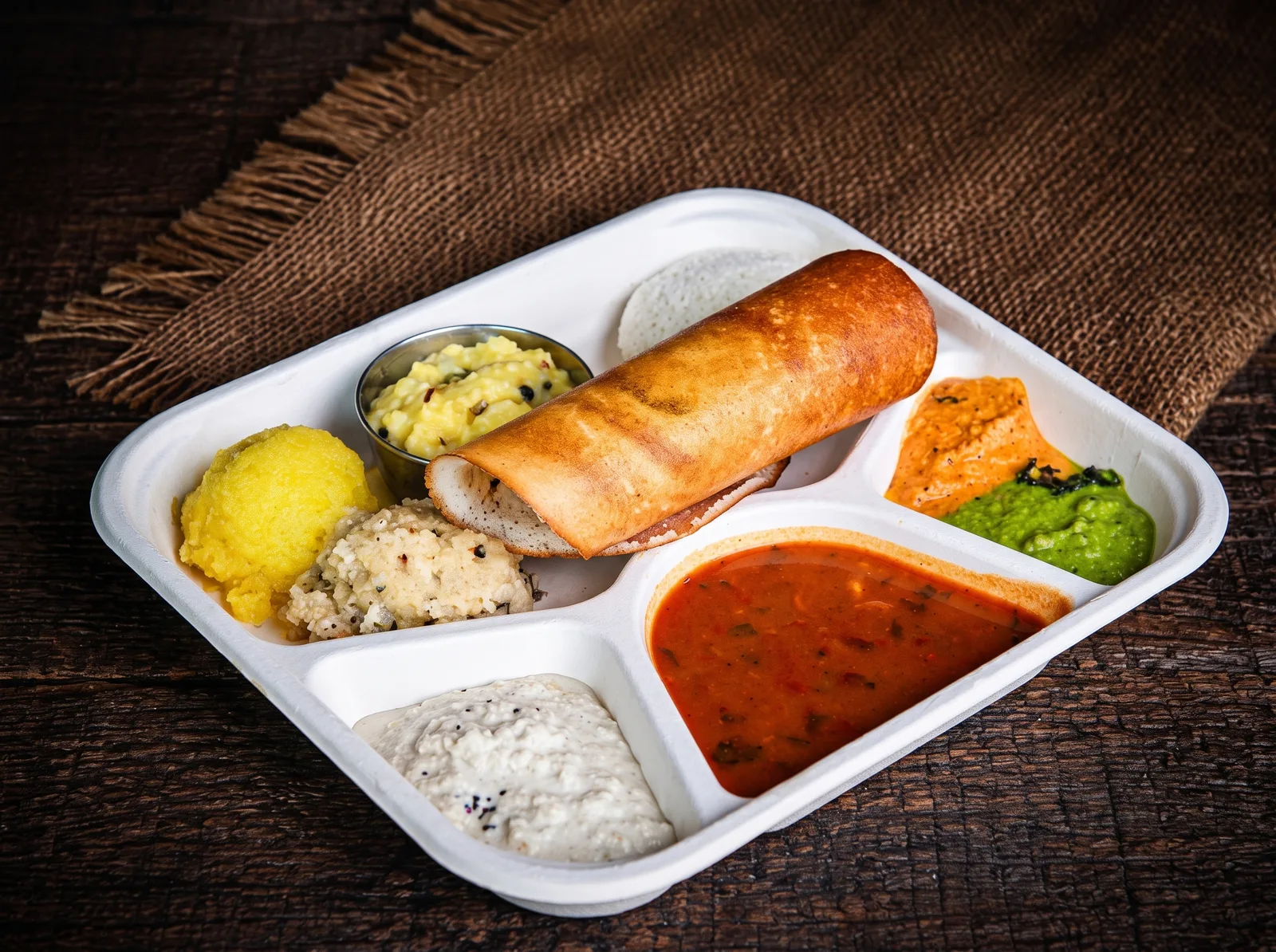 Mini Tiffin tray with dosa, idli, baths, sambar, and chutneys